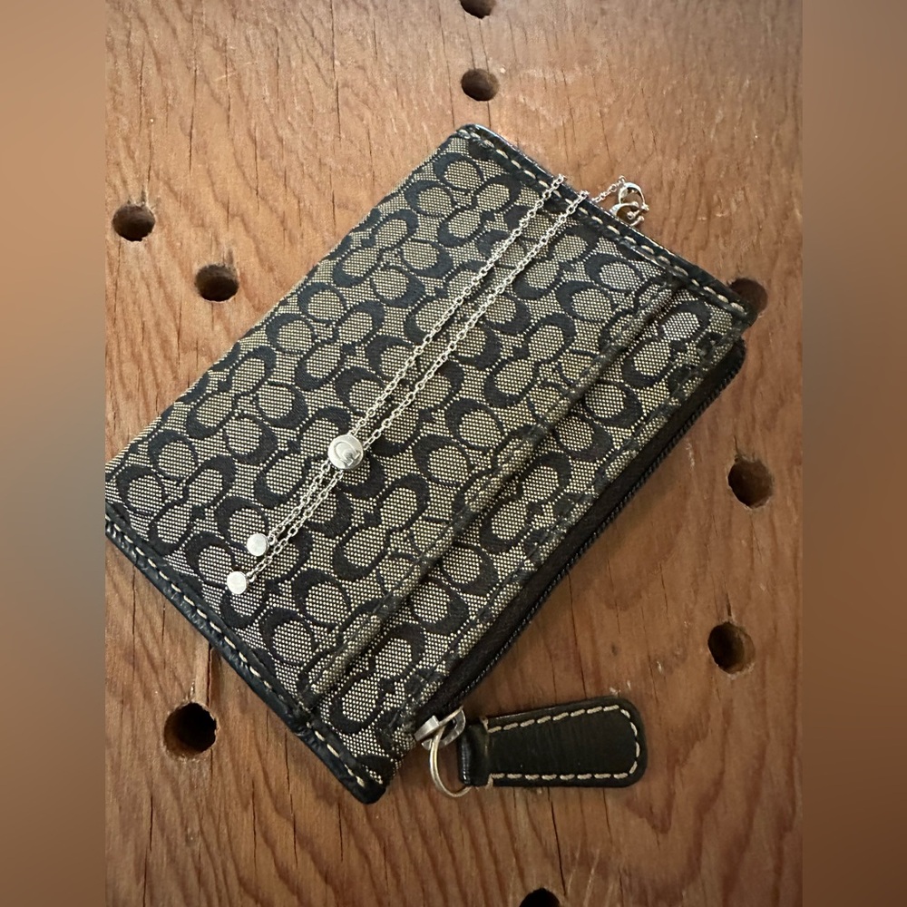 Price is firm- Coach Bracelet - I will send with the pouch